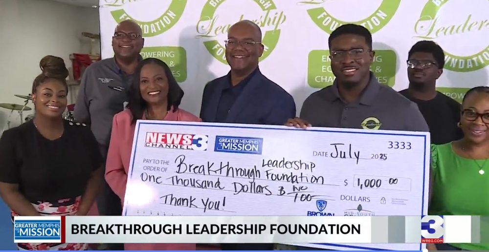 Receiving a $1,000 gift from News Channel 3's Greater Memphis on a Mission